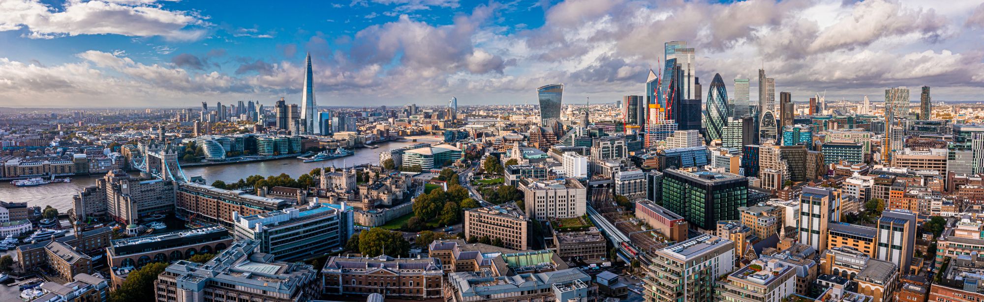 A wide, editorial shot: UK business districts, or a clean data-led map overlay.