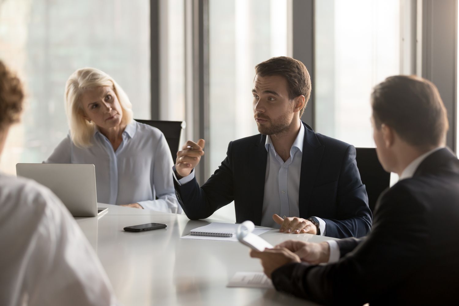 An agency team mid-pitch, or a campaign being planned. Collaborative and real.