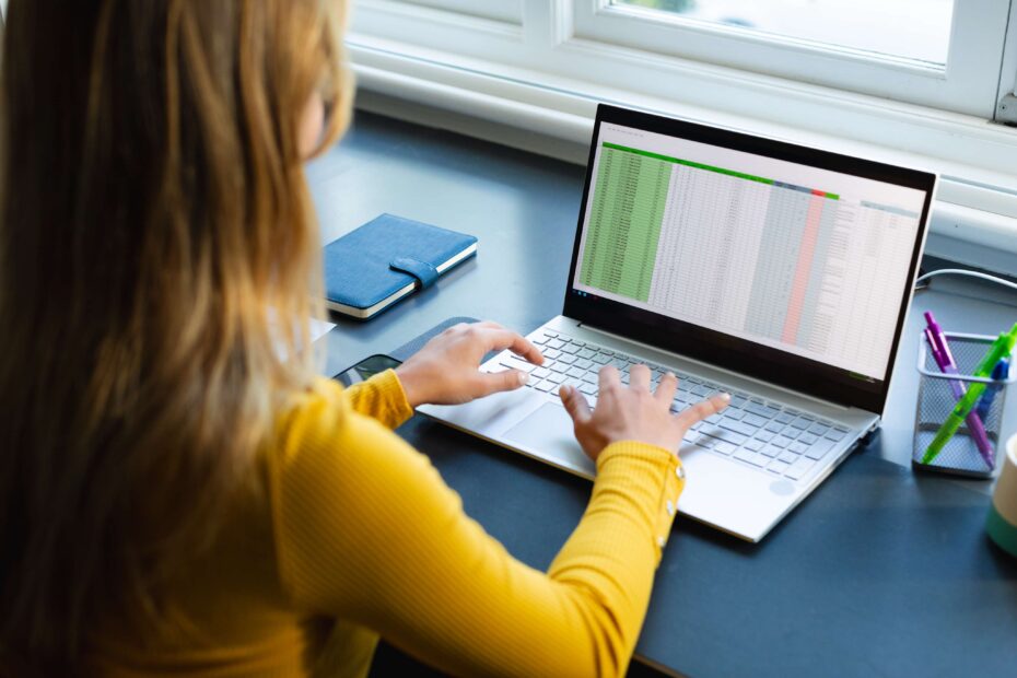Focused caucasian woman sitting at desk working f 2025 04 05 05 42 10 utc
